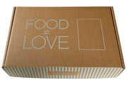 Brown cardboard box with 'FOOD = LOVE' text written on box