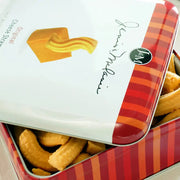 Close up of an open tin of Janis & Melanie Original Cheese Straws