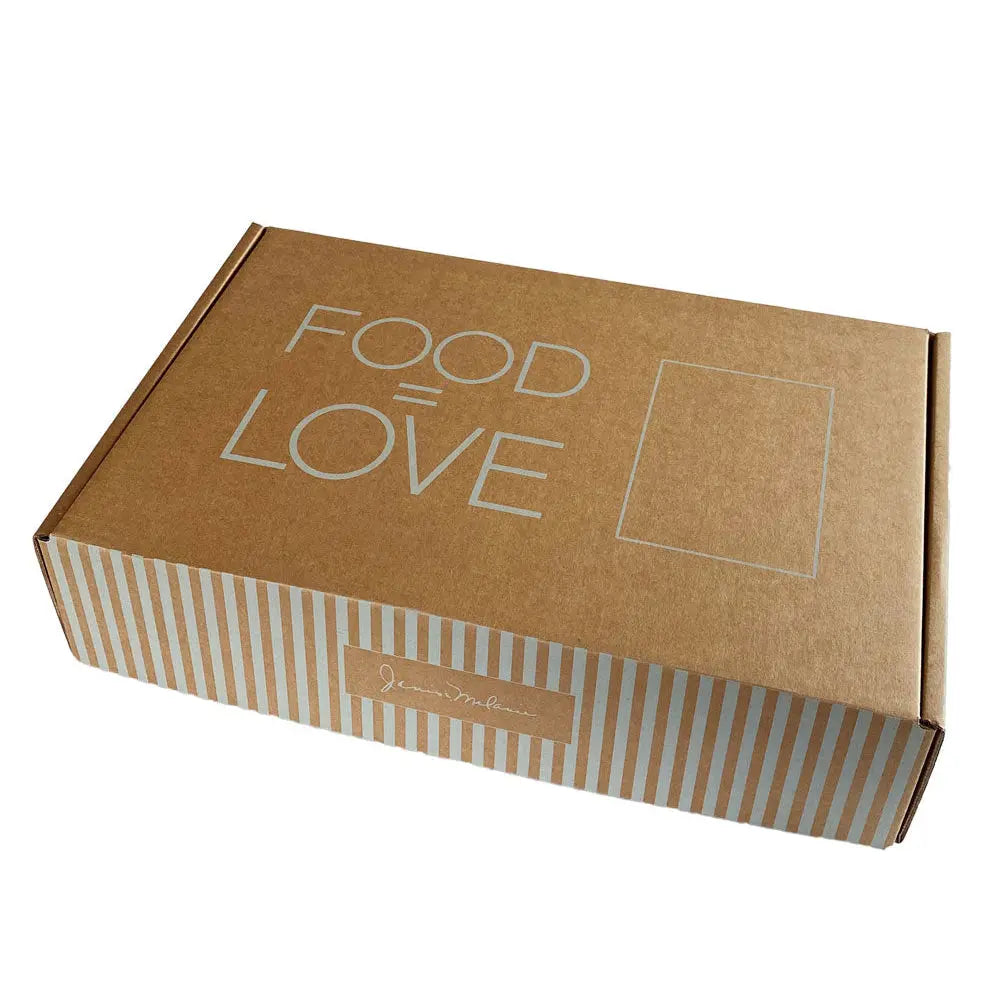 Closed brown kraft Janis & Melanie gift box printed with 'Food = Love'