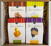 A gift box containing four 2.5 oz cartons of assorted cookies and cheese straws with visible packaging for each item.