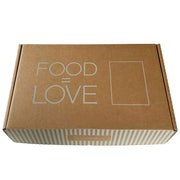 Closed brown kraft Janis & Melanie gift box printed with 'Food = Love'