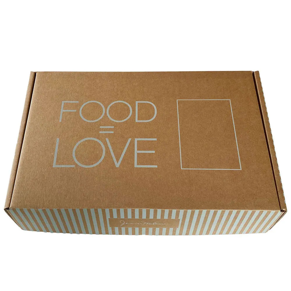 Closed brown kraft Janis & Melanie gift box printed with 'Food = Love'